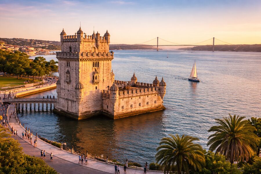 View of Lisbon with Bel&eacute;m Tower and the Tagus river at golden hour