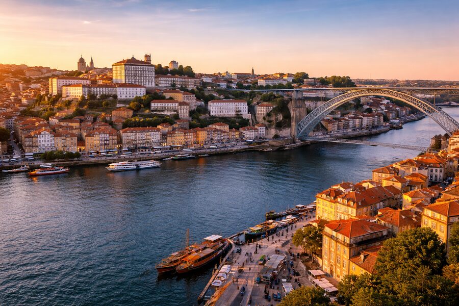 Porto Ribeira and Dom Lu&iacute;s I bridge at sunset